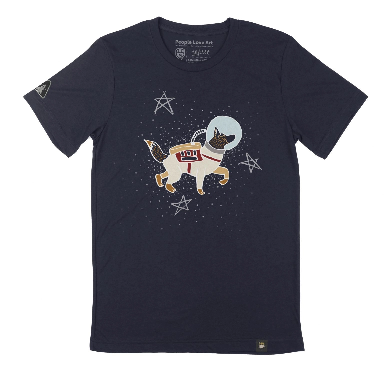 A navy blue Unisex t-shirt with the “Space Walkies” design. The design features an illustration of a German Shepard in a spacesuit and bubble helmet, facing to the right. The space suit is cream and tan colored with a red vest and accents. She wears a backpack connected to her light blue bubble helmet by a white hose, and her fluffy tail is raised out of the back of the suit. The dog floats in front of a field of small dot stars and three large five pointed stars in faded white.