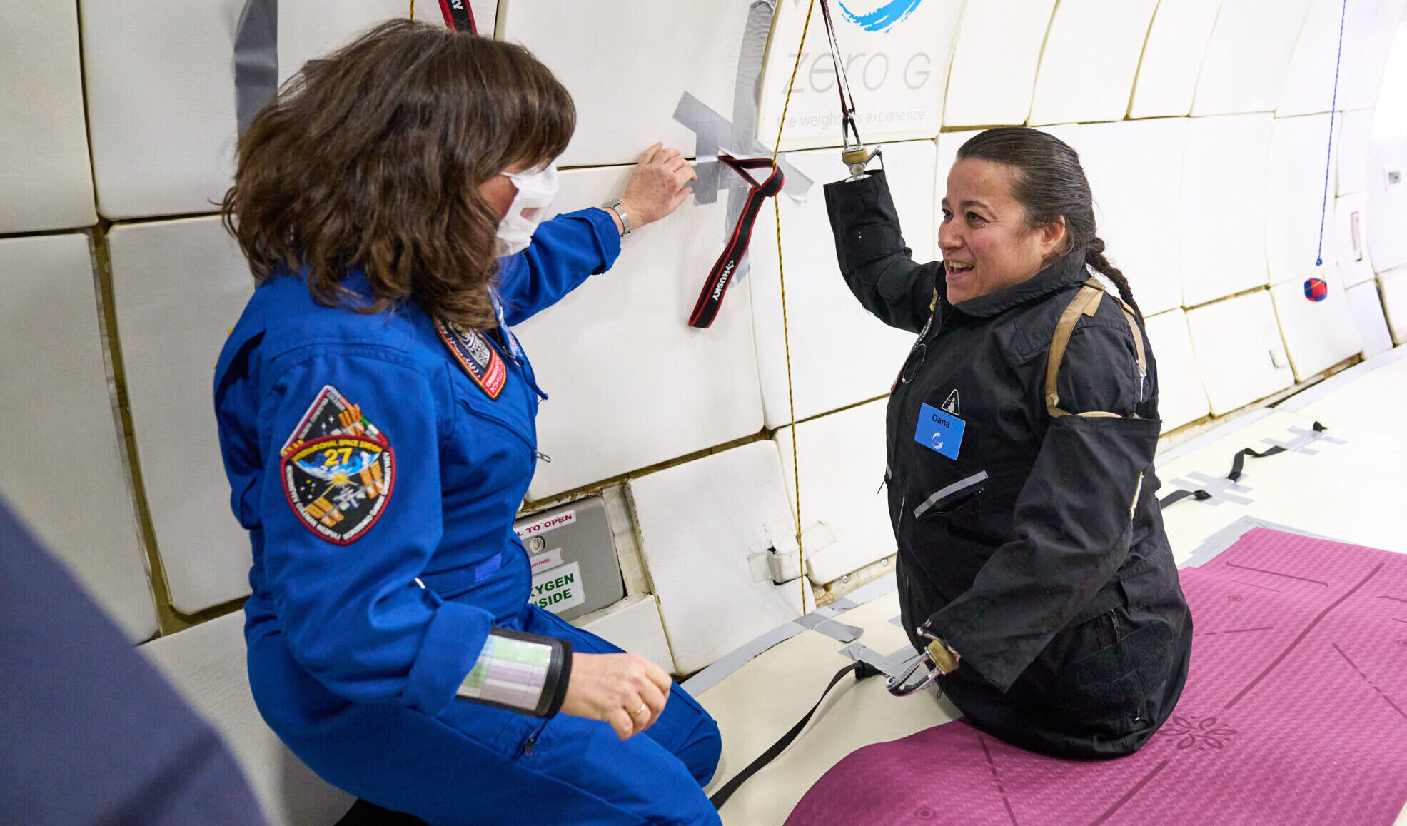 Dana, a quadriplegic hispanic woman, talks to Cady Coleman, American chemist and former NASA astronaut.