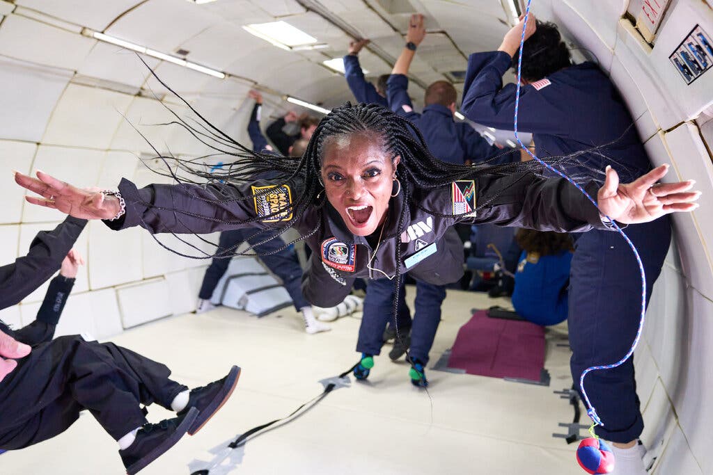 Centra Mazyck, who is an incomplete paraplegic, aboard AstroAccess Flight One, a parabolic flight that carried 12 people with physical disabilities to see how they would fare in a zero-gravity environment.Credit...Al Powers/AstroAccess/Zero G Corporation