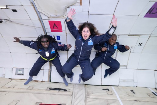Three ambassadors float in zero-gravity to investigate accessibility techniques for future space vehicles and space stations